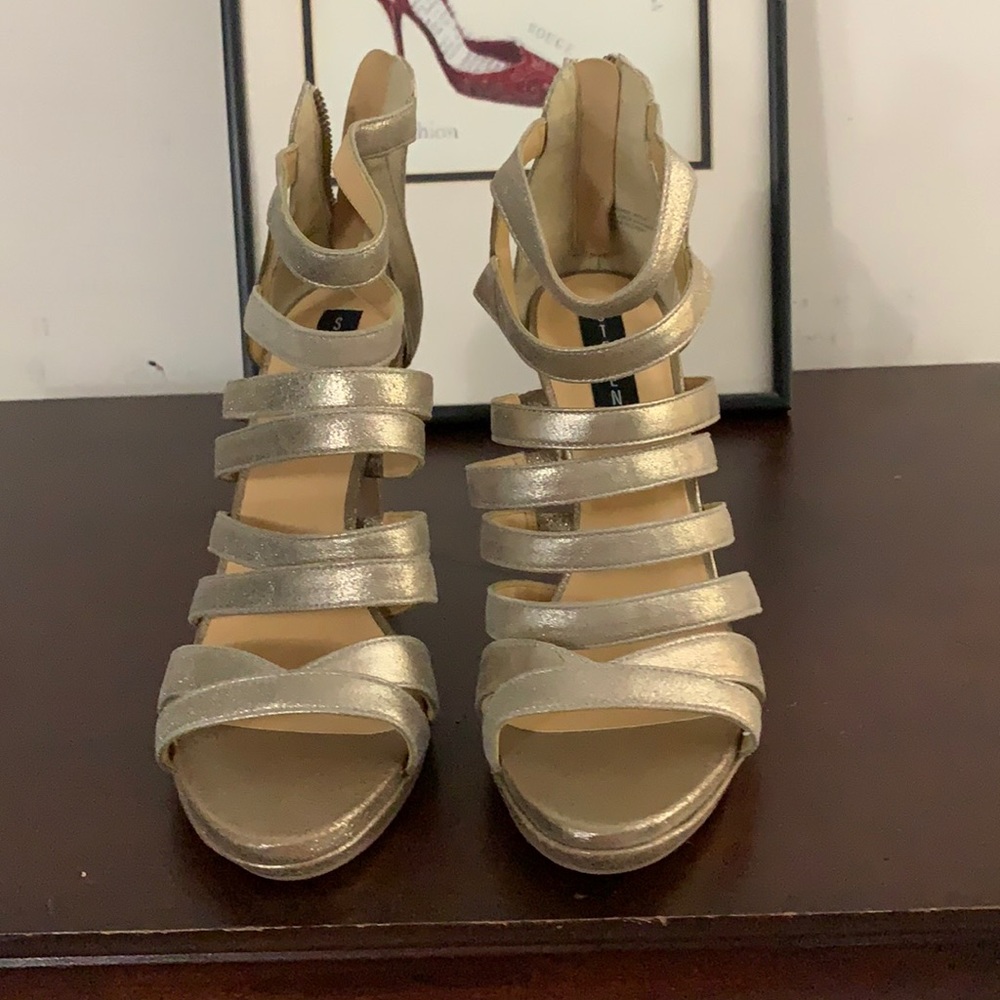 Steven by Steve Madden gold sandals.